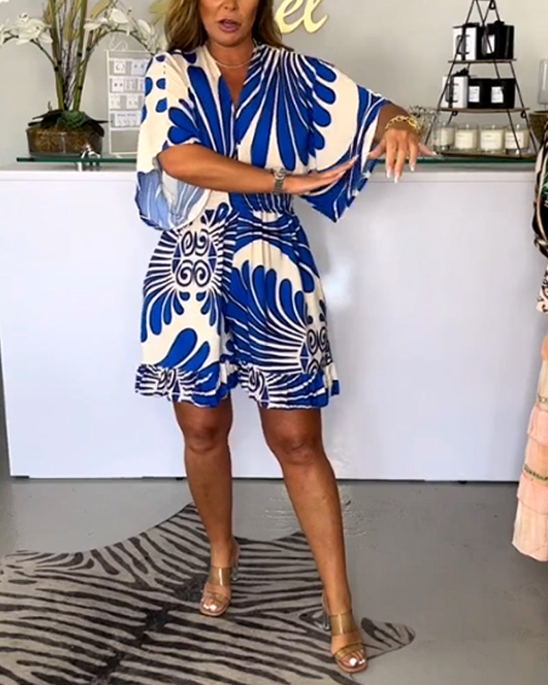 Tessa | Feestelijke dames jumpsuit met V-hals en trendy print