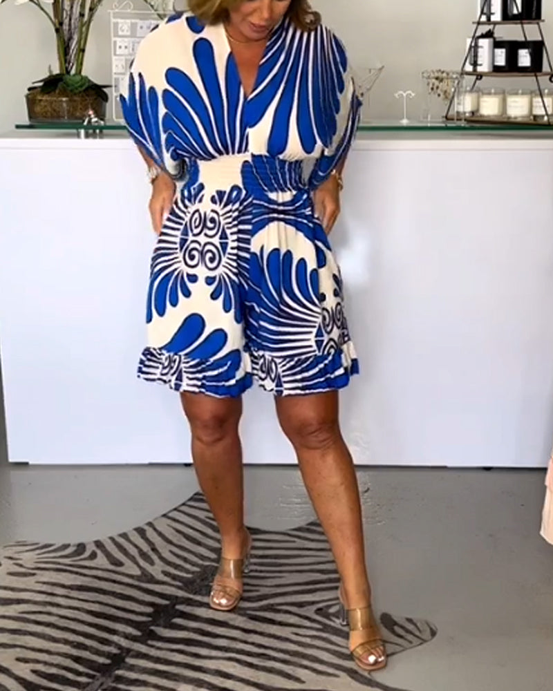Tessa | Feestelijke dames jumpsuit met V-hals en trendy print