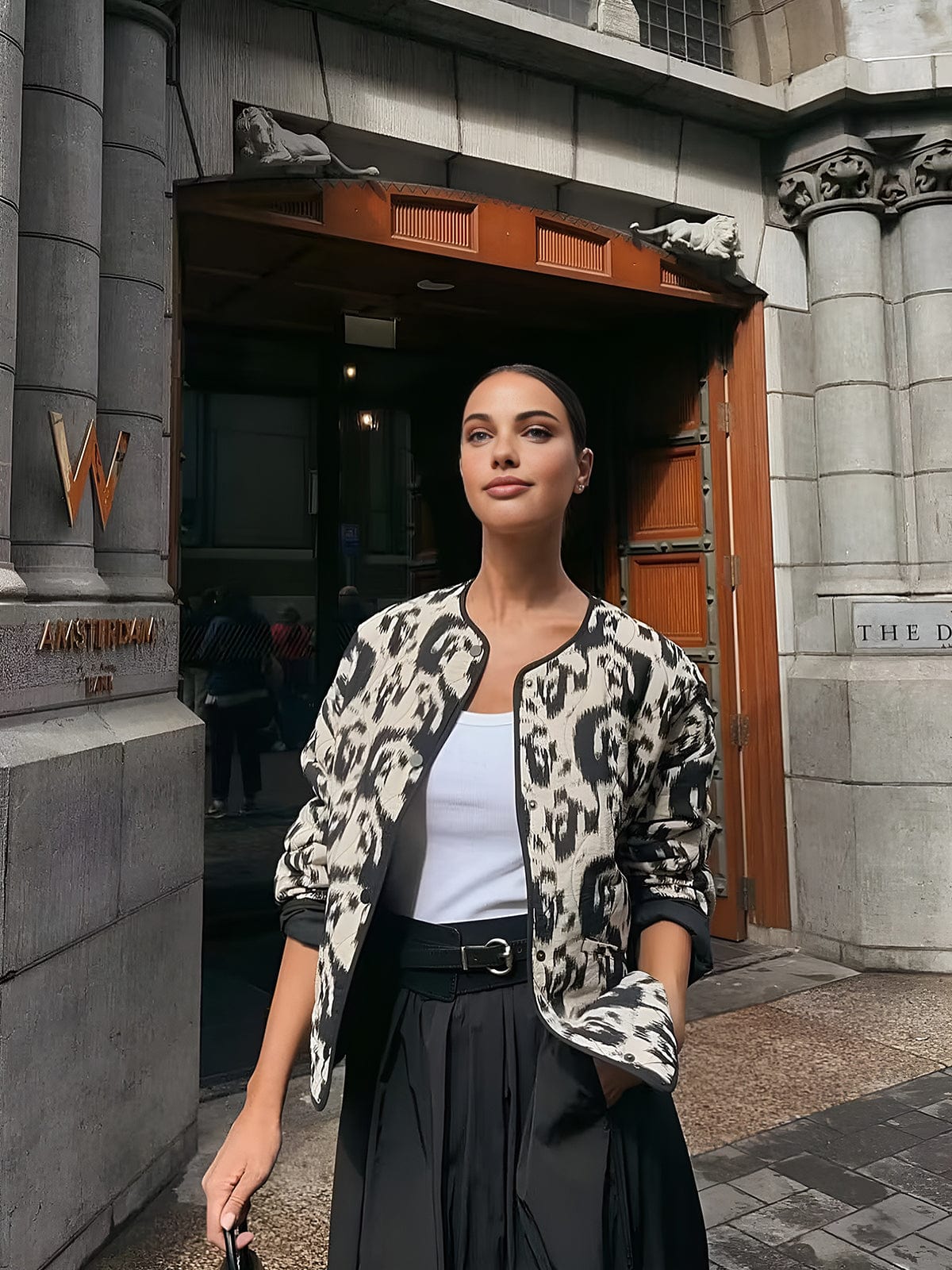Emma | Lange Dames Jas met Opvallende Dierenprint voor Stijlvolle Look 5
