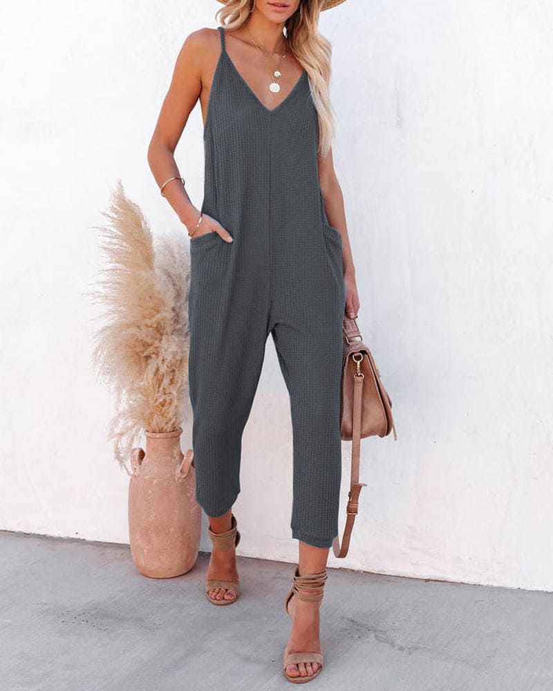 Suzy | Feestelijke zwarte dames jumpsuit met V-hals en mouwloos design
