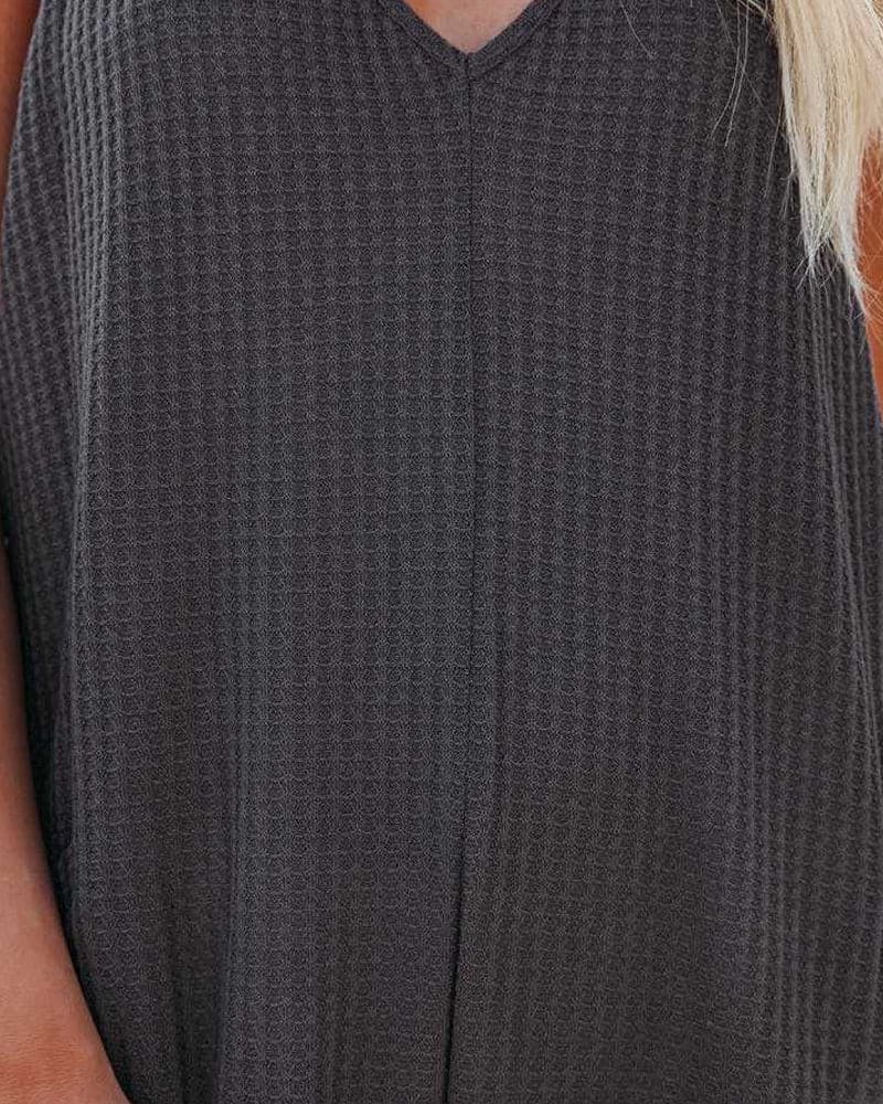 Suzy | Feestelijke zwarte dames jumpsuit met V-hals en mouwloos design