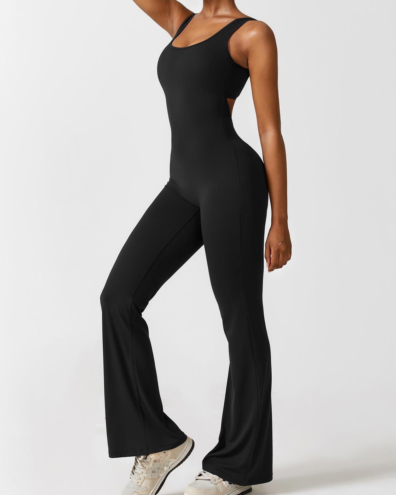 Emma | Zwarte dames jumpsuit met strakke pasvorm en compressieondersteuning