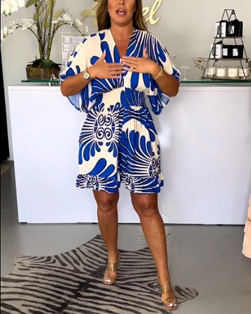 Tessa | Feestelijke dames jumpsuit met V-hals en trendy print