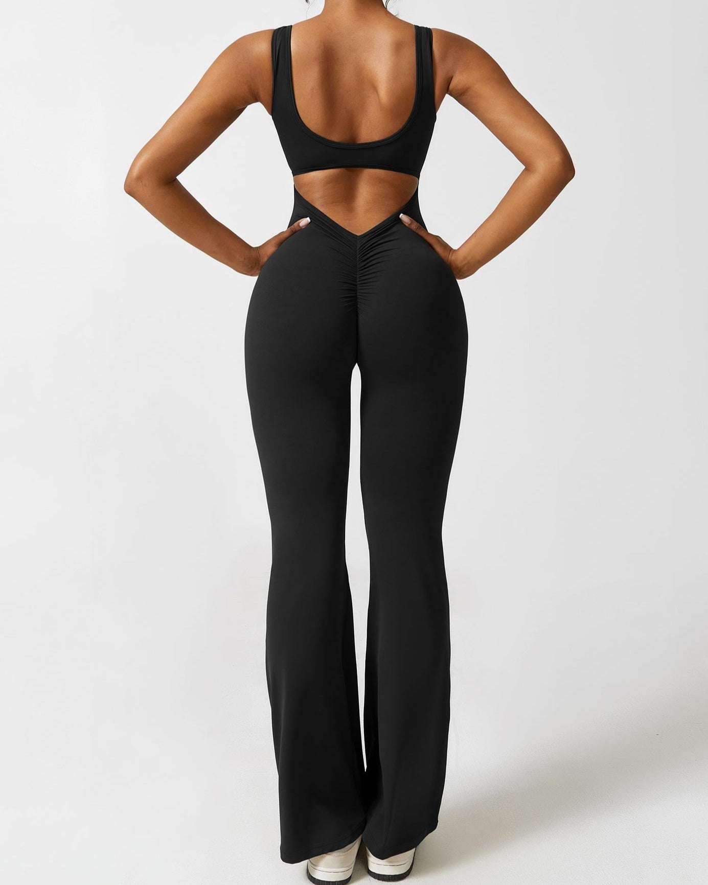 Emma | Zwarte dames jumpsuit met strakke pasvorm en compressieondersteuning